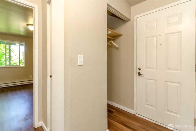 7308 N Skyview Ln Unit I-304, Tacoma, WA 98406 - closet featuring a baseboard radiator