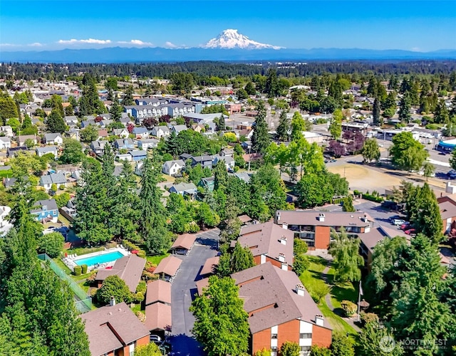 7308 N Skyview Ln Unit I-304, Tacoma, WA 98406 - aerial view of property and surrounding area featuring nearby suburban area and a pool