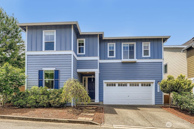 3613 198th Pl SE, Bothell, WA 98012 - view of front of home featuring board and batten siding, concrete driveway, and a garage