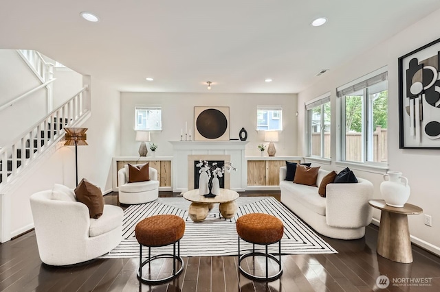 3613 198th Pl SE, Bothell, WA 98012 - living room featuring hardwood / wood-style floors, stairs, recessed lighting, and a fireplace
