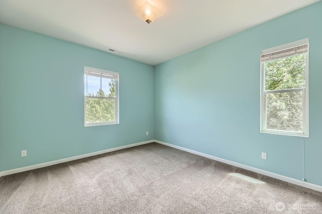 3613 198th Pl SE, Bothell, WA 98012 - empty room featuring carpet floors and baseboards