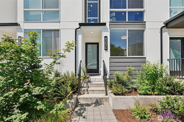 4303 Dayton Ave N Unit E, Seattle, WA 98103 - doorway to property featuring stucco siding