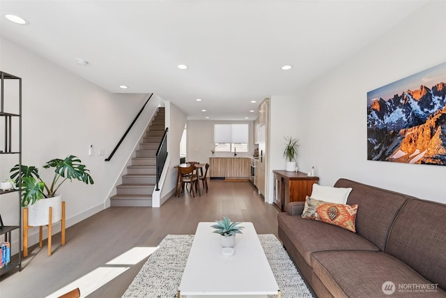 4303 Dayton Ave N Unit E, Seattle, WA 98103 - living room with wood finished floors, stairway, and recessed lighting