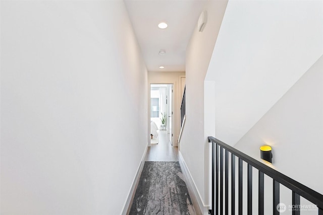 4303 Dayton Ave N Unit E, Seattle, WA 98103 - hallway featuring an upstairs landing, wood finished floors, and recessed lighting