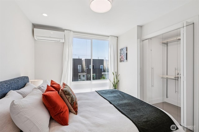 4303 Dayton Ave N Unit E, Seattle, WA 98103 - bedroom with a wall mounted AC and recessed lighting
