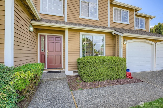 34427 10th Ave SW, Federal Way, WA 98023 - view of exterior entry featuring roof with shingles and a garage