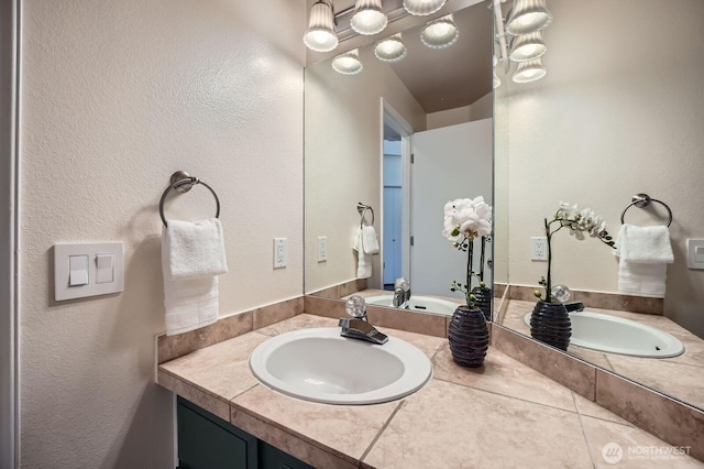 34427 10th Ave SW, Federal Way, WA 98023 - bathroom featuring double vanity and a textured wall