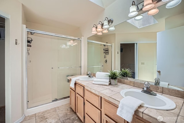 34427 10th Ave SW, Federal Way, WA 98023 - full bath featuring a shower stall, double vanity, and a walk in closet
