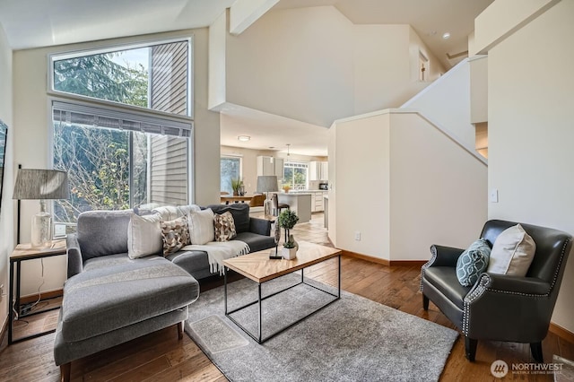 34427 10th Ave SW, Federal Way, WA 98023 - living room with hardwood / wood-style flooring, high vaulted ceiling, and stairs
