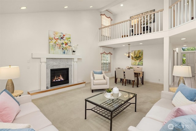8612 218th St SW, Edmonds, WA 98026 - carpeted living room with a premium fireplace, high vaulted ceiling, and recessed lighting