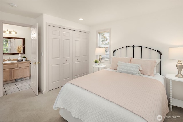 8612 218th St SW, Edmonds, WA 98026 - bedroom featuring light colored carpet, a closet, and recessed lighting