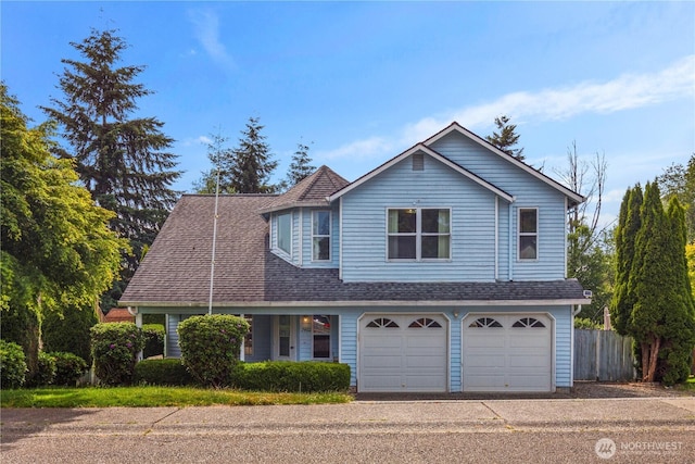 7402 7th Dr W, Everett, WA 98203 - traditional-style home with an attached garage, roof with shingles, and driveway