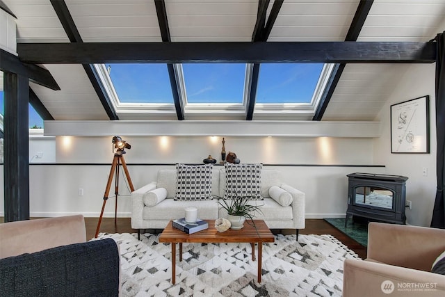 2822 Boyer Ave E Unit 11, Seattle, WA 98102 - living area featuring a wood stove, wood finished floors, and a skylight
