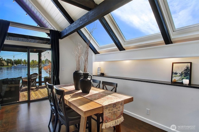 2822 Boyer Ave E Unit 11, Seattle, WA 98102 - dining room with a skylight, wood finished floors, and a water view