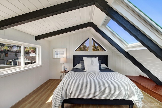 2822 Boyer Ave E Unit 11, Seattle, WA 98102 - bedroom with wood finished floors and wood walls