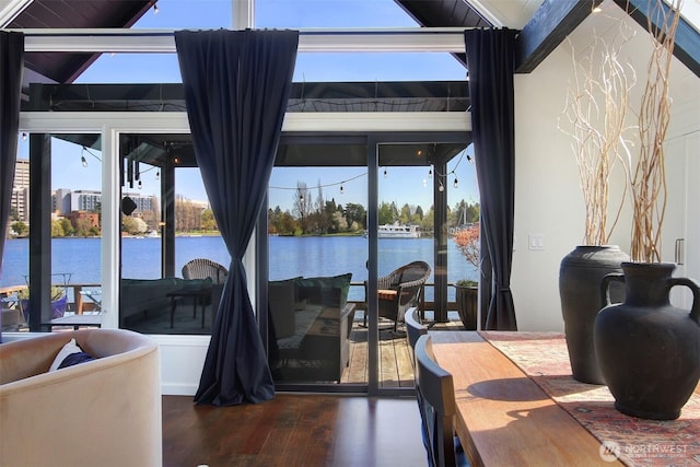 2822 Boyer Ave E Unit 11, Seattle, WA 98102 - dining space with dark wood-style floors and a water view