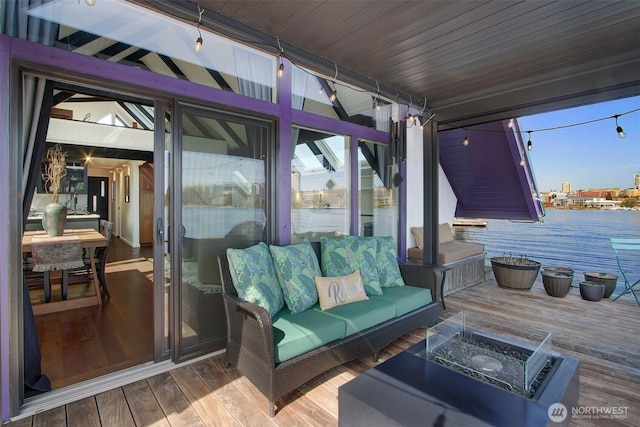 2822 Boyer Ave E Unit 11, Seattle, WA 98102 - wooden terrace with an outdoor living space with a fire pit