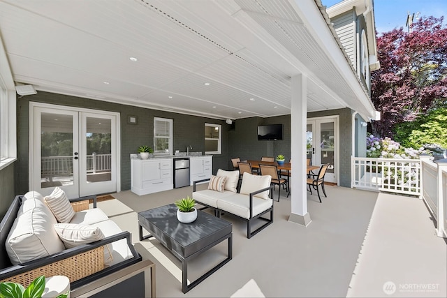 3505 W 43rd Ave, Seattle, WA 98199 - view of patio / terrace with french doors, an outdoor hangout area, and outdoor dining area