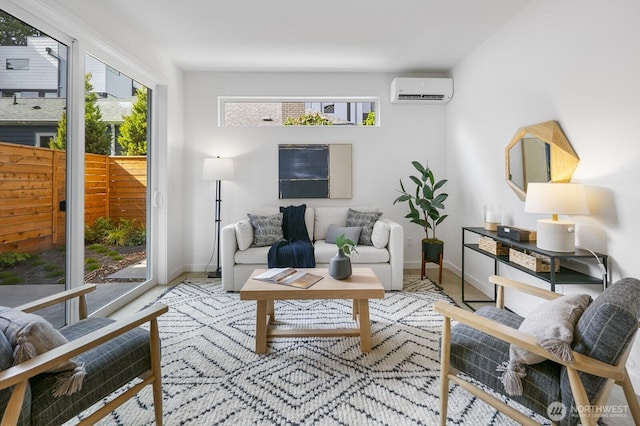9021A 13th Ave NW, Seattle, WA 98117 - living area featuring baseboards and an AC wall unit