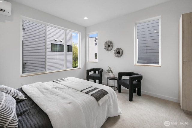 9021A 13th Ave NW, Seattle, WA 98117 - carpeted bedroom featuring a wall mounted AC and recessed lighting