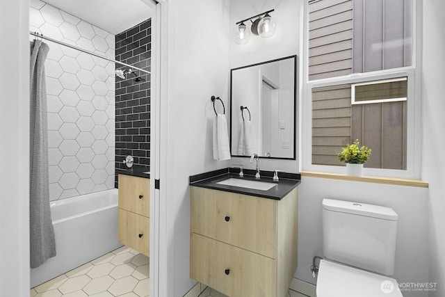 9021A 13th Ave NW, Seattle, WA 98117 - bathroom featuring vanity, shower / bath combination with curtain, and tile patterned flooring