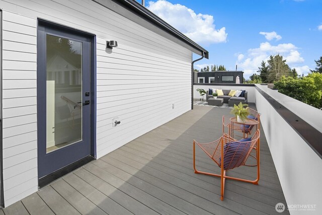 9021A 13th Ave NW, Seattle, WA 98117 - wooden terrace featuring an outdoor living space