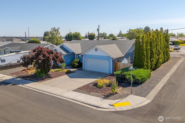 206 E St NE, Ephrata, WA 98823 - ranch-style home with an attached garage and concrete driveway