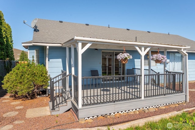 206 E St NE, Ephrata, WA 98823 - rear view of house with a patio area and roof with shingles