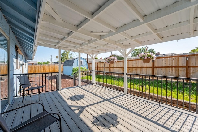 206 E St NE, Ephrata, WA 98823 - deck featuring a shed and a fenced backyard