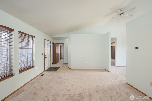 206 E St NE, Ephrata, WA 98823 - spare room featuring lofted ceiling, light colored carpet, and a ceiling fan