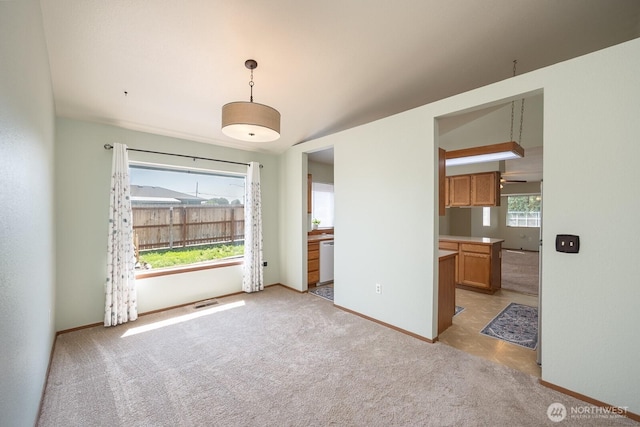 206 E St NE, Ephrata, WA 98823 - spare room featuring light colored carpet and baseboards