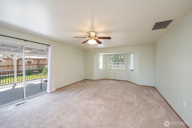 206 E St NE, Ephrata, WA 98823 - carpeted spare room featuring a ceiling fan and baseboards