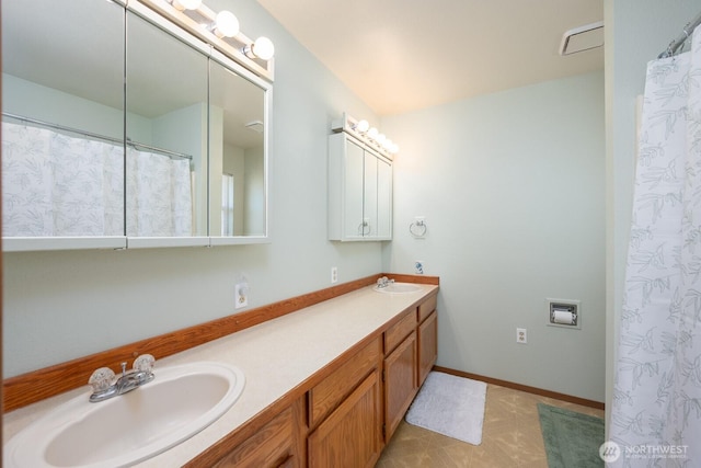206 E St NE, Ephrata, WA 98823 - full bathroom featuring double vanity and tile patterned flooring