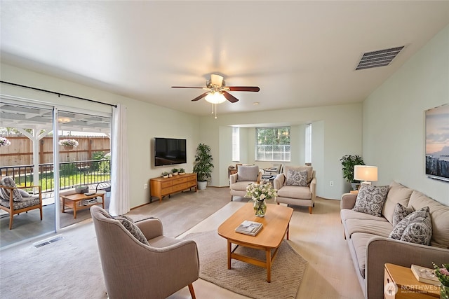 206 E St NE, Ephrata, WA 98823 - living room featuring ceiling fan and light wood-style floors