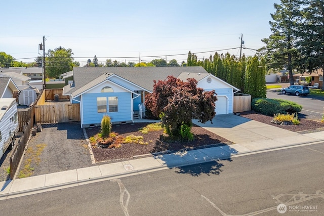 206 E St NE, Ephrata, WA 98823 - view of front of house with concrete driveway and an attached garage