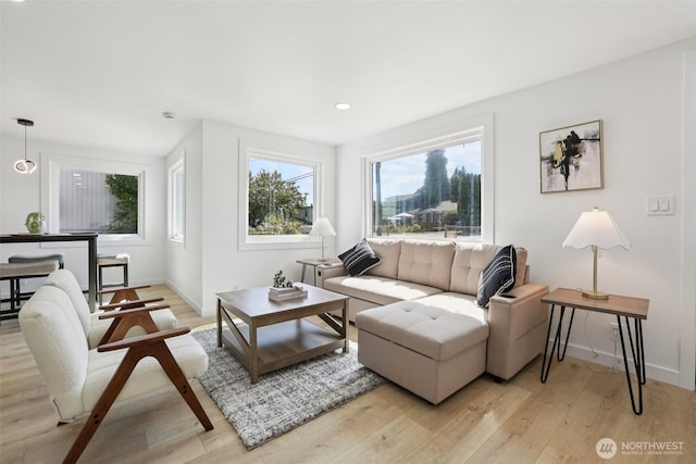 12448 Occidental Ave S, Seattle, WA 98168 - living room with light wood-style flooring and recessed lighting