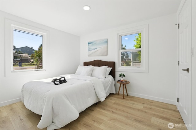 12448 Occidental Ave S, Seattle, WA 98168 - bedroom with light wood finished floors and recessed lighting