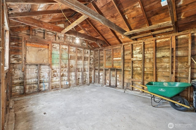 12448 Occidental Ave S, Seattle, WA 98168 - miscellaneous room with lofted ceiling and unfinished concrete flooring