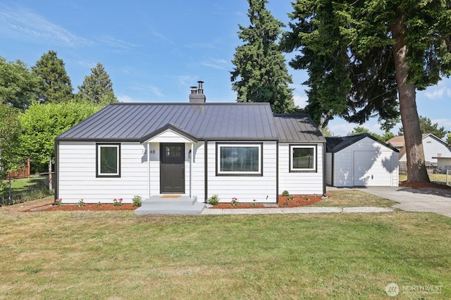12448 Occidental Ave S, Seattle, WA 98168 - single story home featuring a chimney, driveway, a metal roof, and an outbuilding