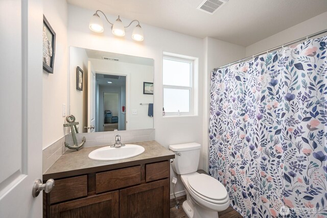 4211 W Heaverlo Dr, Moses Lake, WA 98837 - bathroom with vanity and a shower with curtain