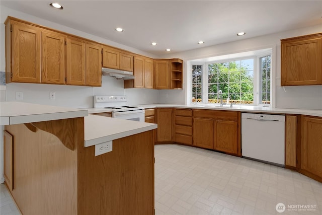 19517 Whiteman Cove Rd SW, Longbranch, WA 98351 - kitchen featuring white appliances, a peninsula, recessed lighting, open shelves, and light countertops