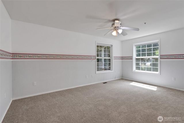 19517 Whiteman Cove Rd SW, Longbranch, WA 98351 - spare room with carpet flooring and a ceiling fan