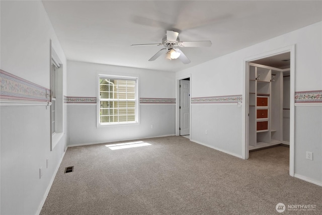 19517 Whiteman Cove Rd SW, Longbranch, WA 98351 - unfurnished bedroom featuring carpet and a ceiling fan
