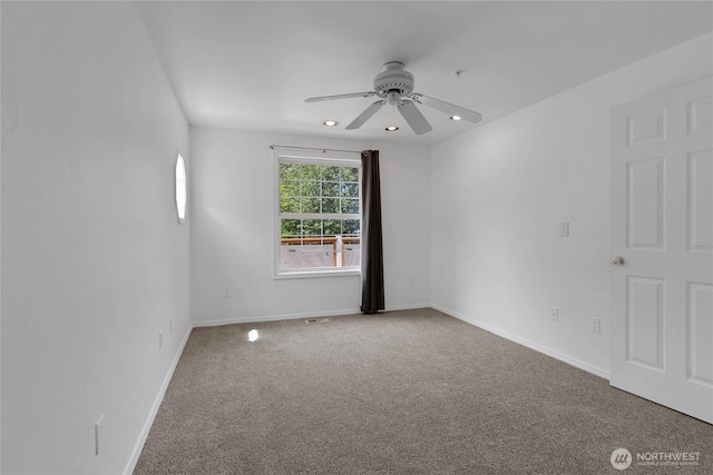 19517 Whiteman Cove Rd SW, Longbranch, WA 98351 - carpeted spare room with a ceiling fan and recessed lighting