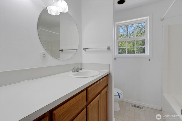 19517 Whiteman Cove Rd SW, Longbranch, WA 98351 - bathroom with vanity, shower / washtub combination, and tile patterned floors
