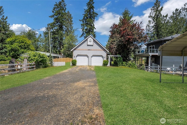 19517 Whiteman Cove Rd SW, Longbranch, WA 98351 - view of front facade featuring a garage and an outbuilding
