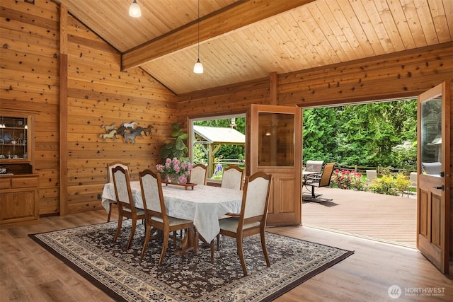 7717 252nd Ave NE, Redmond, WA 98053 - dining area featuring wooden ceiling, wooden walls, and light wood-type flooring