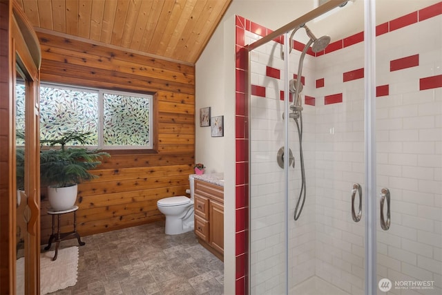 7717 252nd Ave NE, Redmond, WA 98053 - bathroom with wood walls, wood ceiling, vanity, a shower stall, and stone finish flooring