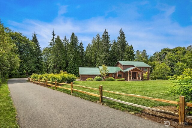 7717 252nd Ave NE, Redmond, WA 98053 - view of asphalt road with a forest view