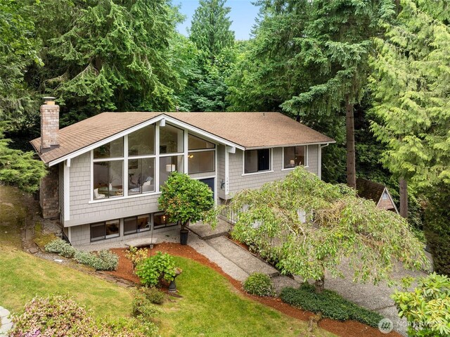 14913 SE 47th Ct, Bellevue, WA 98006 - split foyer home with a chimney and roof with shingles